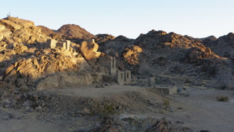 Flying-Towards-Ruins-At-Red-Cloud-Mine,-Arizona,-USA,-Aerial