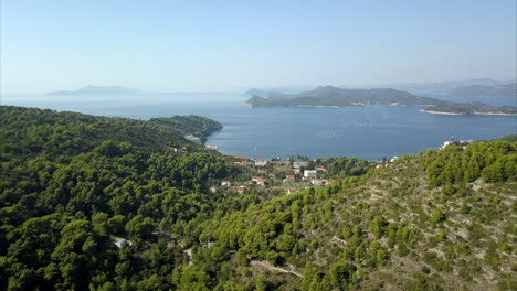 lopud island harbour, slow reveal aerial shot