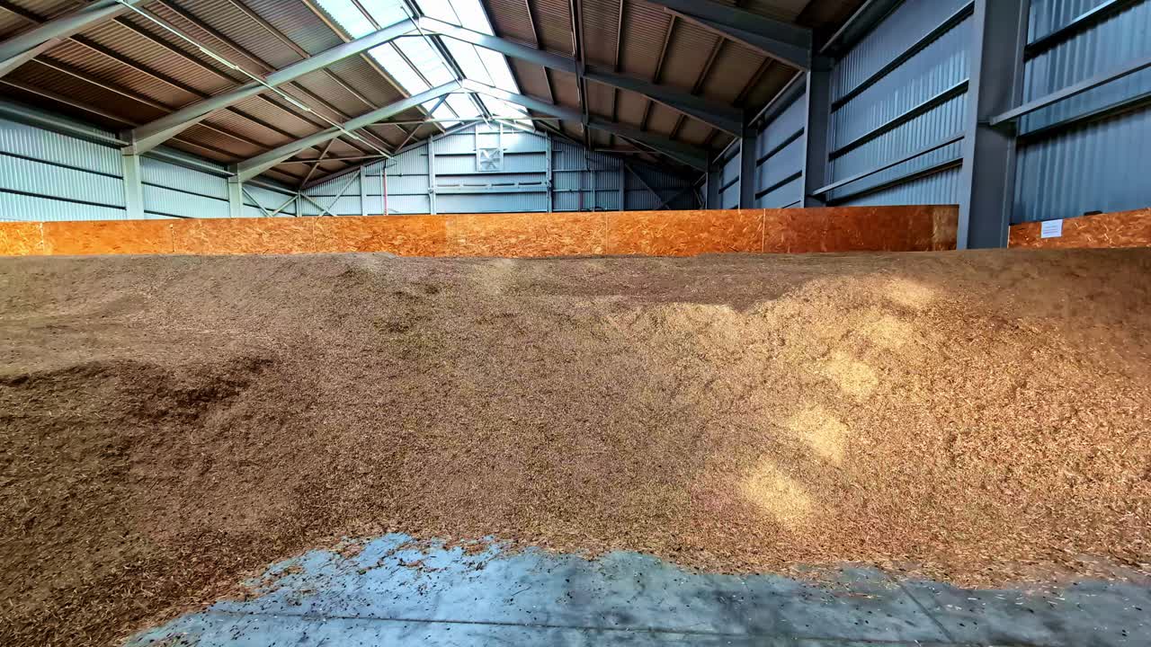Pile Of Wood Chips In Stock, Wood Processing Industry In Dobele, Latvia - Wide Shot