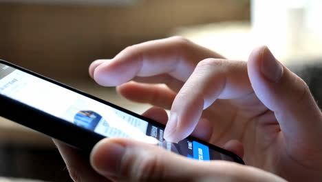 hands using a mobile phone