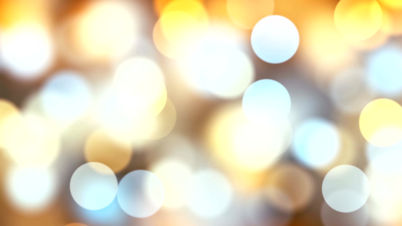 황금 색 박이는 추상적인 걱거리는 반이는 반이는 보케 배경