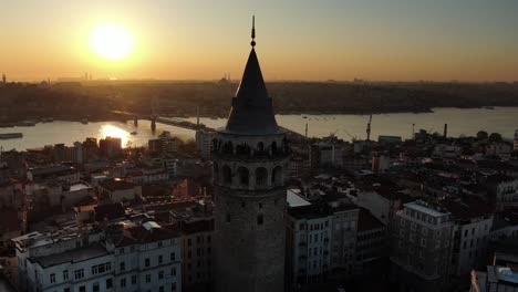 istanbul, galata tower, morning to day. aerial view of galata tower vith golden horn.