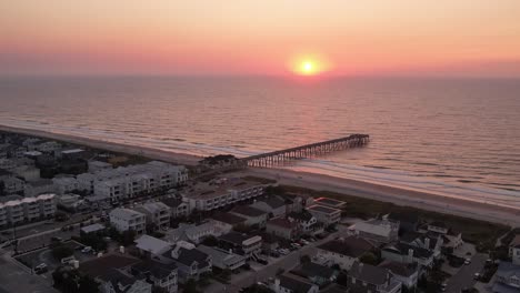 aerial tilt down at sunrise wrightsville beach nc, north carolina