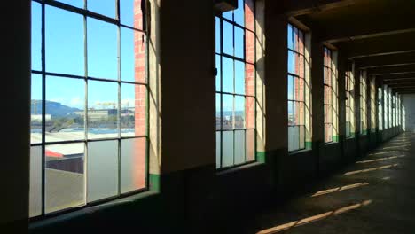 Aerial-shot-of-windows-at-a-Belfast-Spinning-Mill-Warehouse-on-a-sunny-day