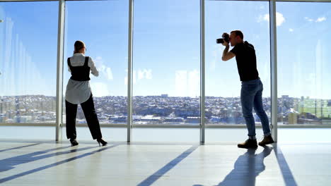 woman posing during photo shooting. fashion photographer and model working together