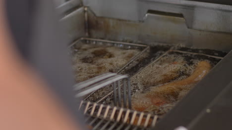 deep-frying some snacks at a party