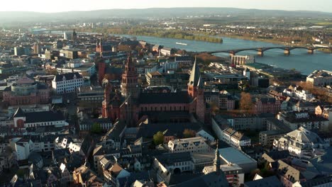 mainz aerial drone shots around the cathedral church on a warm spring day showing the blue river in the back