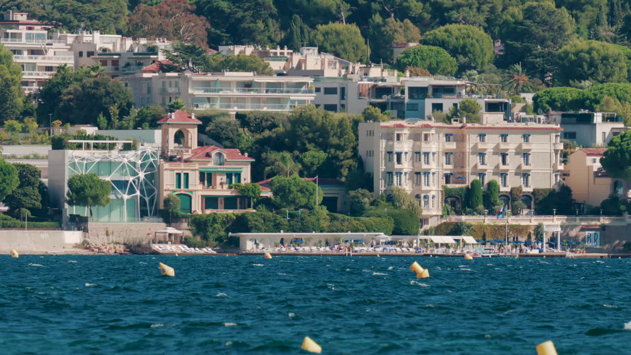 Panoramic view of modern villas and luxury hotels by the sea in Cannes, France
