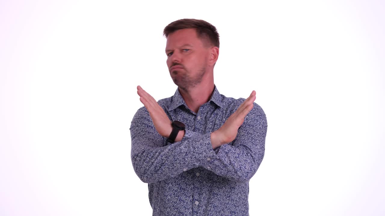 Man with Crossed Arms Expressing Denial