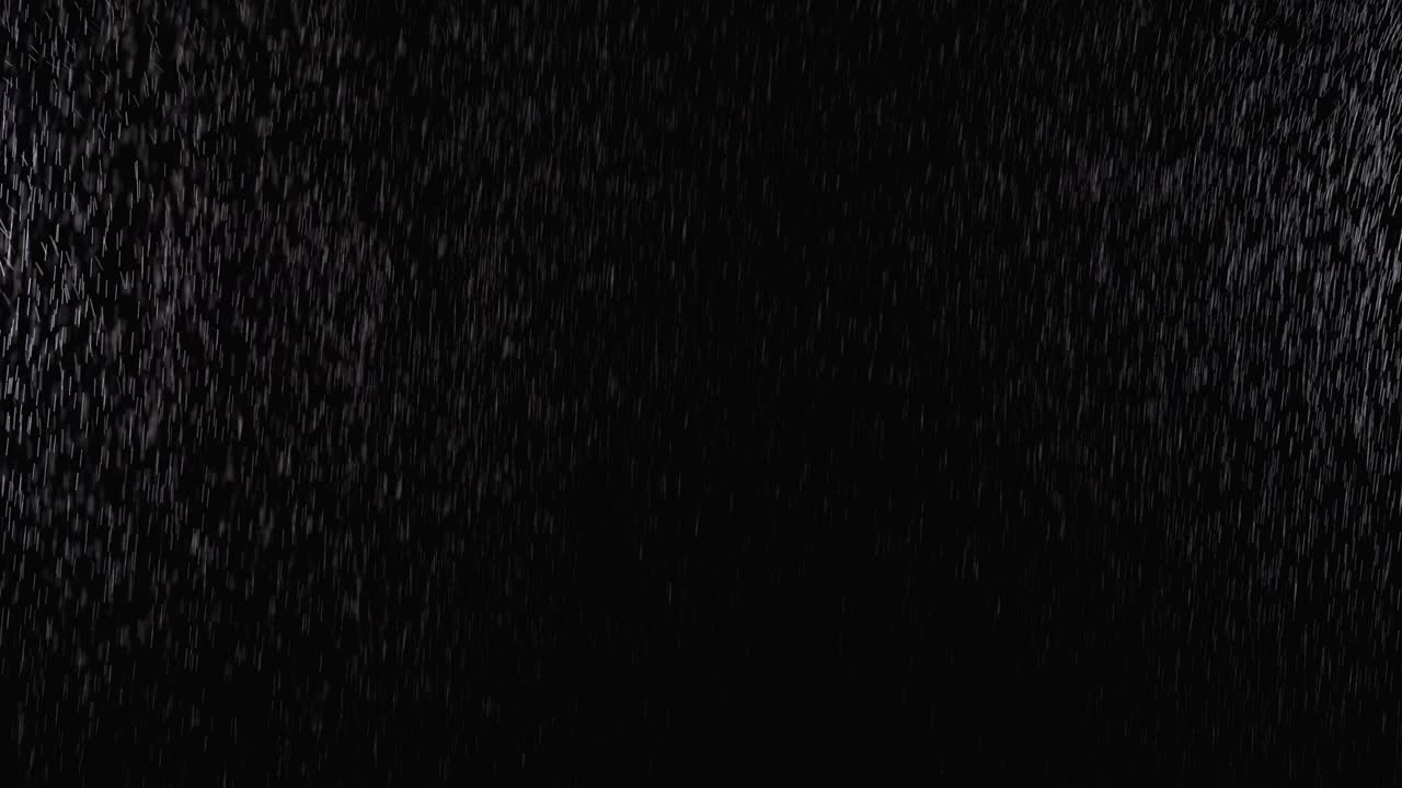 Water Spray against Black Background. Micro Drops of Water Fly in the Air. Slow Motion