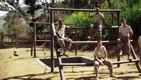 military troops relaxing during obstacle course 4k