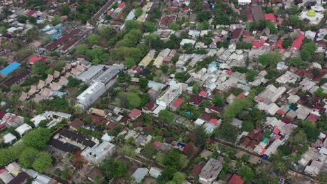 high-altitude-top-down-of-hotels-and-homes-on-Gili-Trawangan-Island-in-Bali-Indonesia