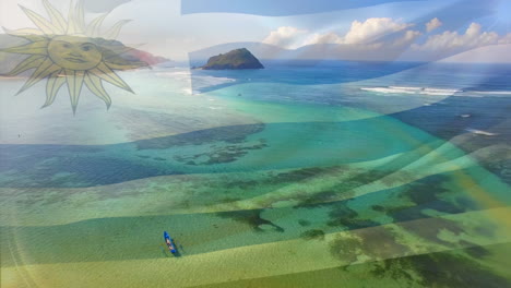 digital composition of waving uruguay flag against aerial view of the sea