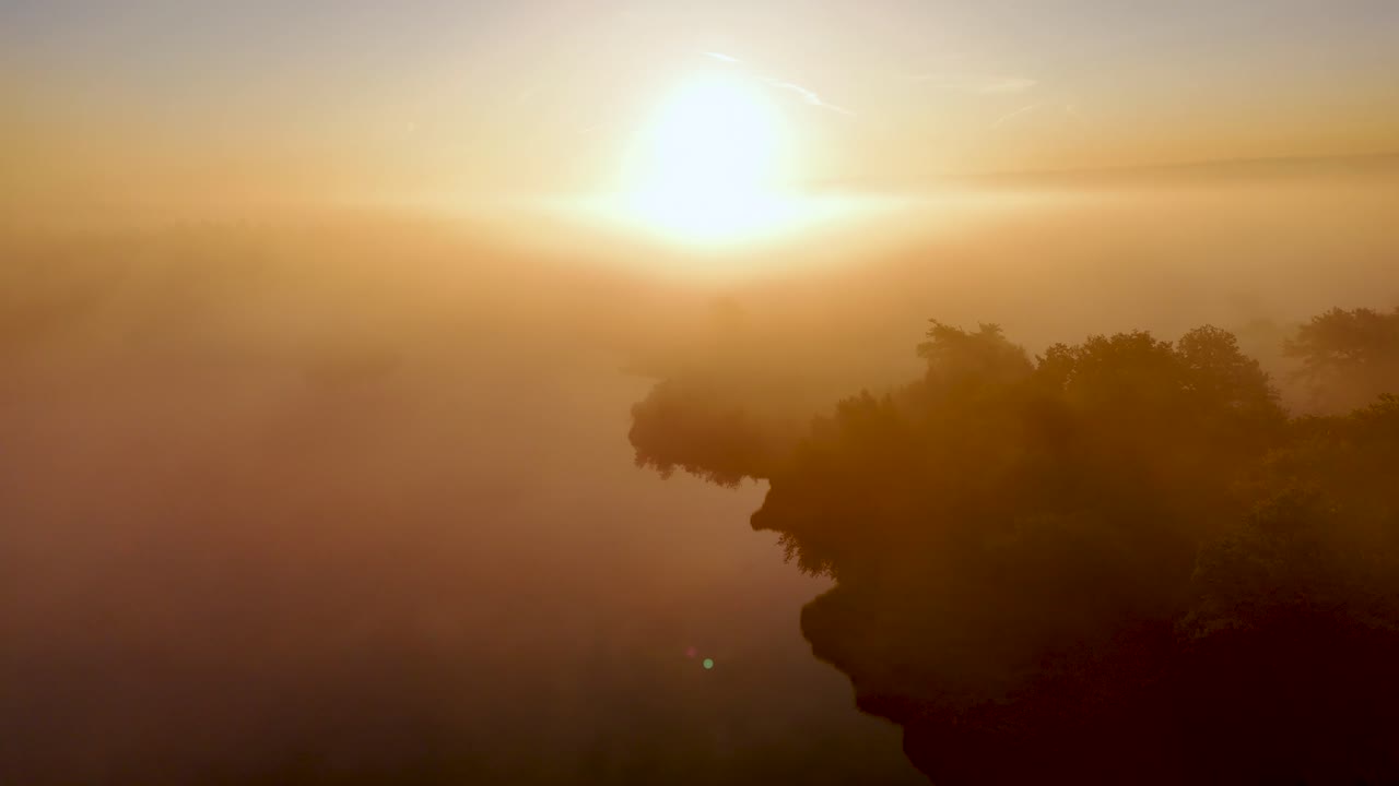 Misty Sunrise Over River with Forest