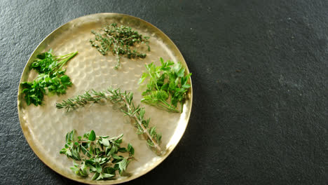 various type of herbs in plate 4k