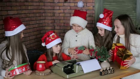 little children sitting on authentic santa claus generous santa claus with a group of children holding gifts in their hands happy children in the usa