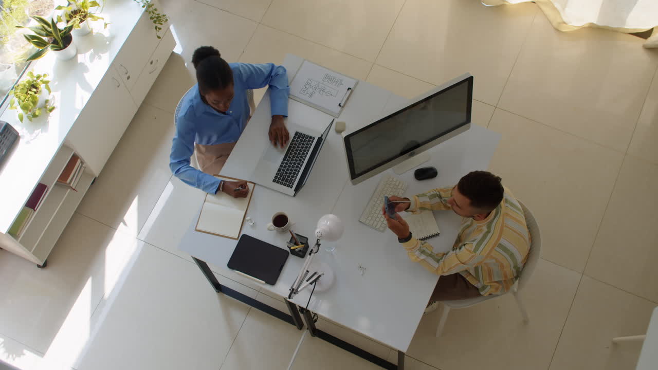 Diverse Managers Working at Office Desk Top Down