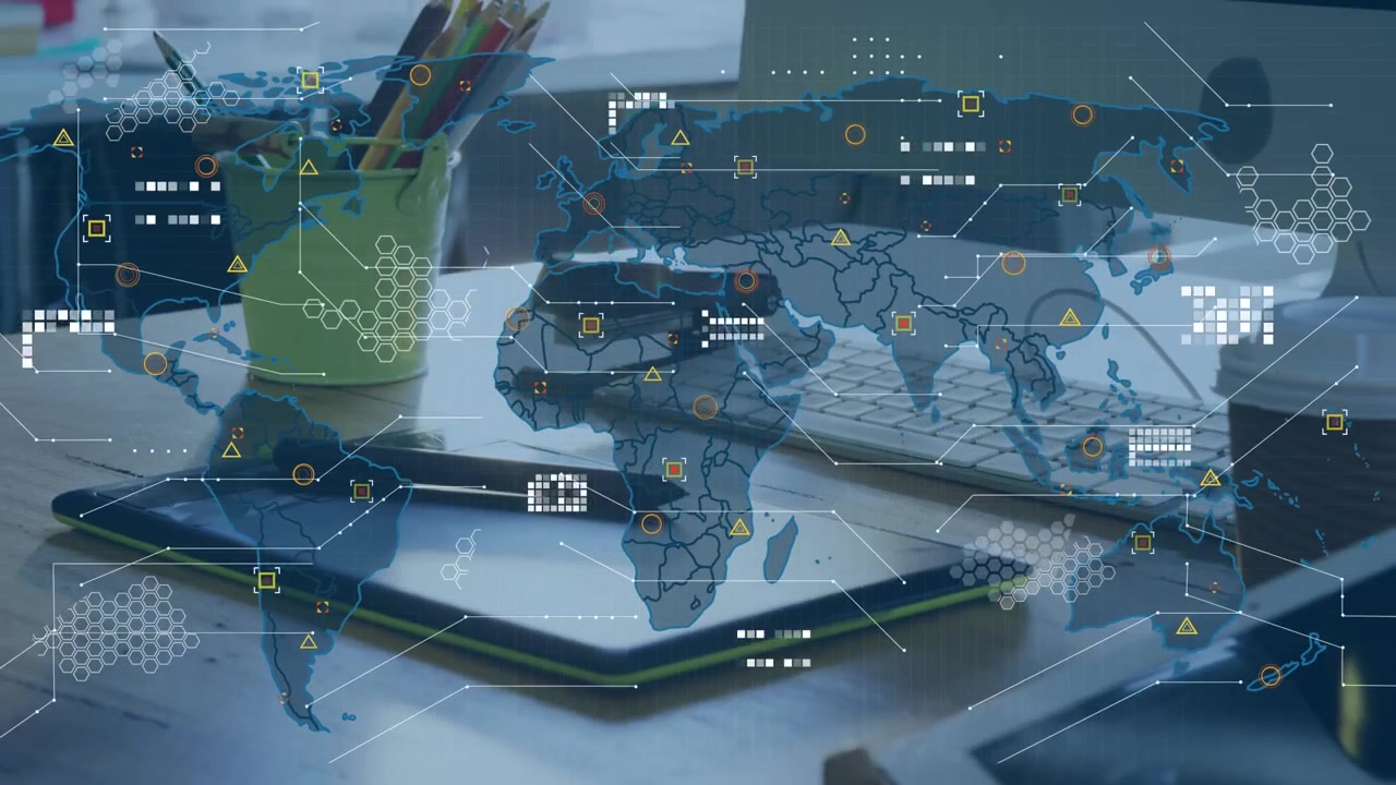 World map with data processing over close up of a office equipment on a desk