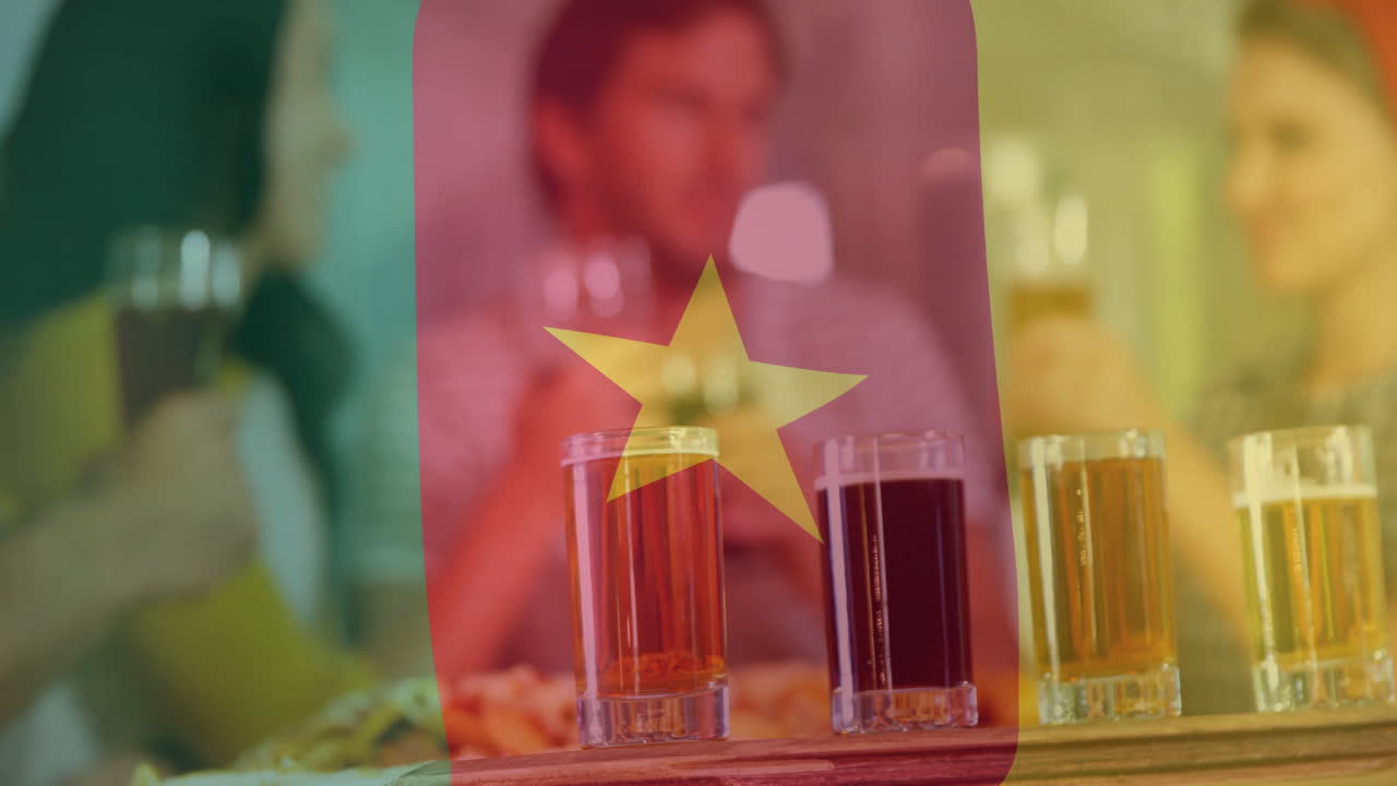 In bar, people drinking with Cameroon flag animation overlay, celebrating together
