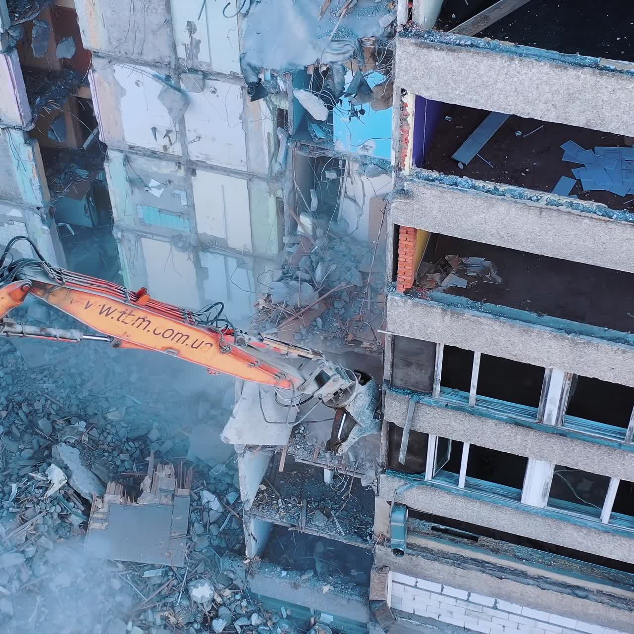 Demotion old house. Destruction of a building using technology