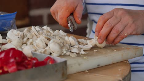 preparing mushrooms and peppers