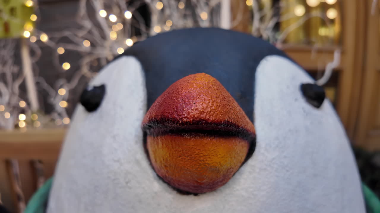 Penguin toy with christmas lights decorations