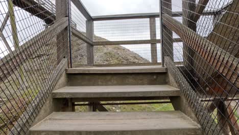 ascending wooden stairs with scenic views