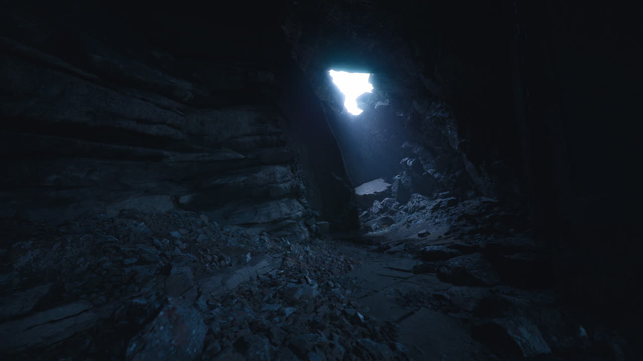 Light beams illuminating a dark cave with rocky textures and shadows