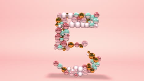 Number-5-made-of-beads,-glass-balls,-pastel-pearls,-crystal-jewels-and-gold