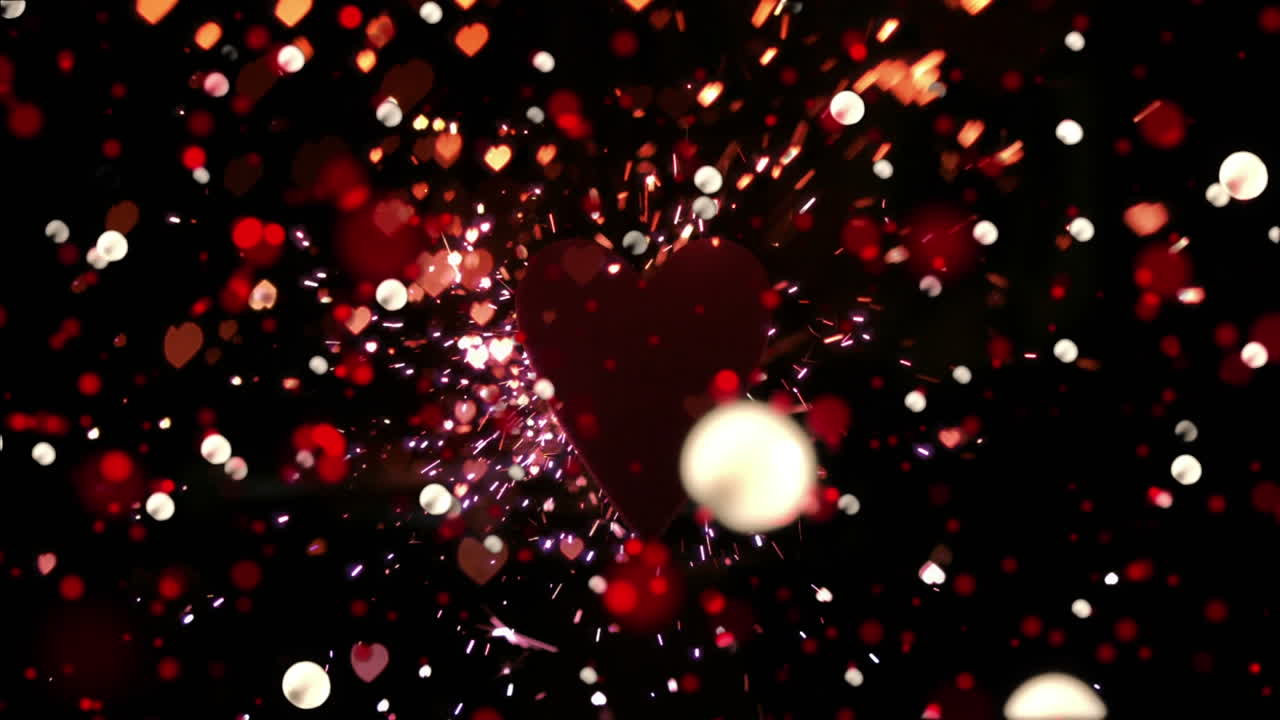 animación de los corazones sobre las manchas que caen.