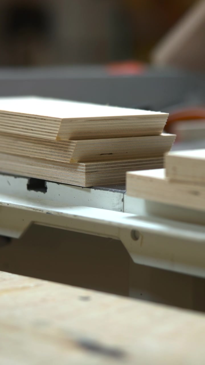 Workbench Stacking Cut Panels Caucasian Cabinetmaker Sorting Pieces For Assembly, Neat Piles Of Plywood, Hands
