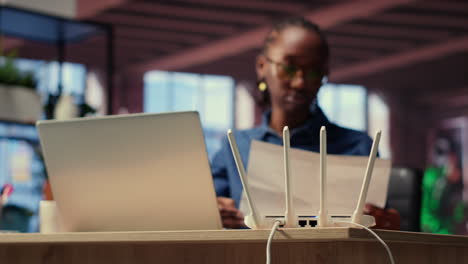 young woman struggling with weak internet connection at home