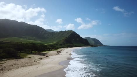 sandy beach coastline with breathtaking scenic background, aerial drone