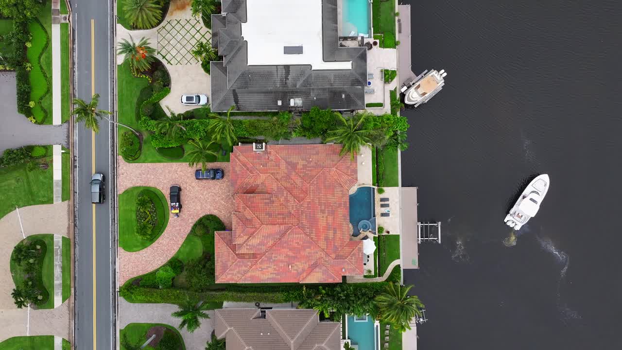 Picture of Premium stock video - Luxury waterfront home with a pool and private ...