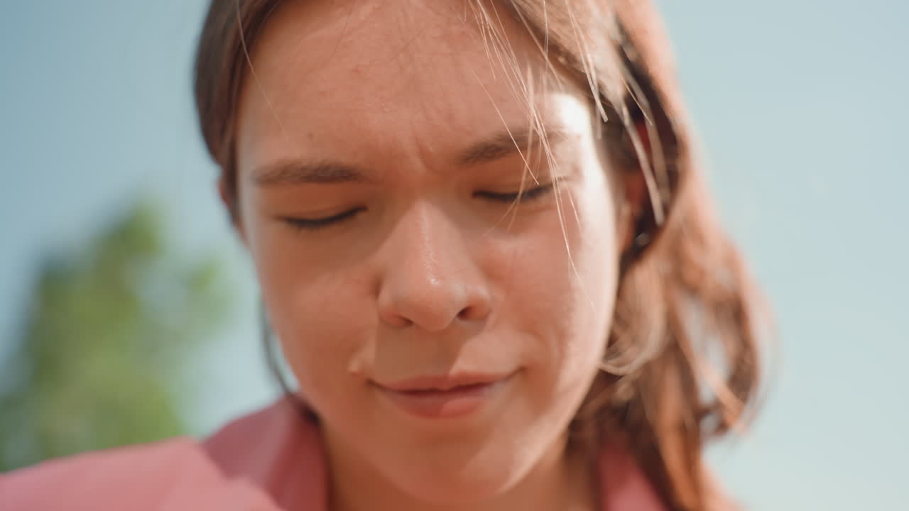 Sophisticated Woman Gazing Peacefully Outside, Refined Lady With Serene Expression Amidst Nature, Refined Woman With Peaceful Demeanor Reflected Outdoors Under Gentle Sunlight And Calm Surroundings