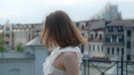 young woman on rooftop