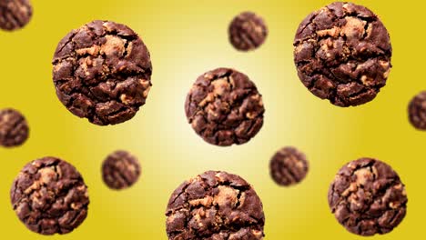 galletas voladoras para el desayuno de diferentes diámetros se mueven al centro en el fondo de gradiente de color amarillo de tendencia (horizontal, no loopable) en imágenes de 4k uhd