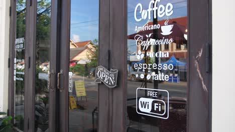 coffee shop exterior with open sign