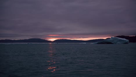 sunset over icy water, outside nuuk greenland