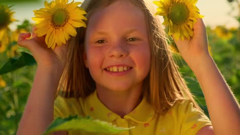smiling girl in a sunflower field