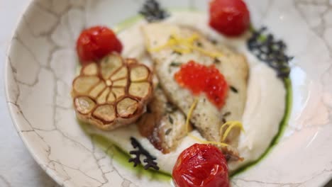 roasted fish with roasted garlic and mashed potatoes