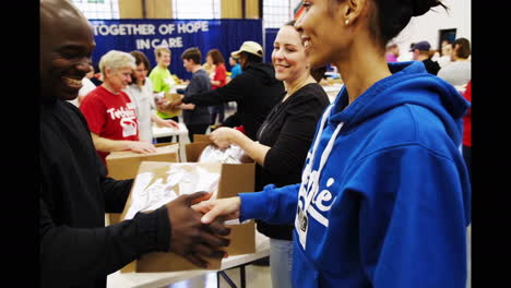 community volunteers packing donations