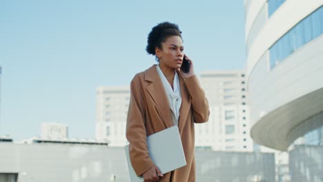businesswoman on a phone call in the city