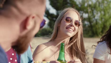 friends drinking cold beer on the summer party/dabrowa gornicza/poland