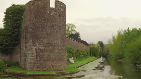 river wall, bishop's palace, wells.
