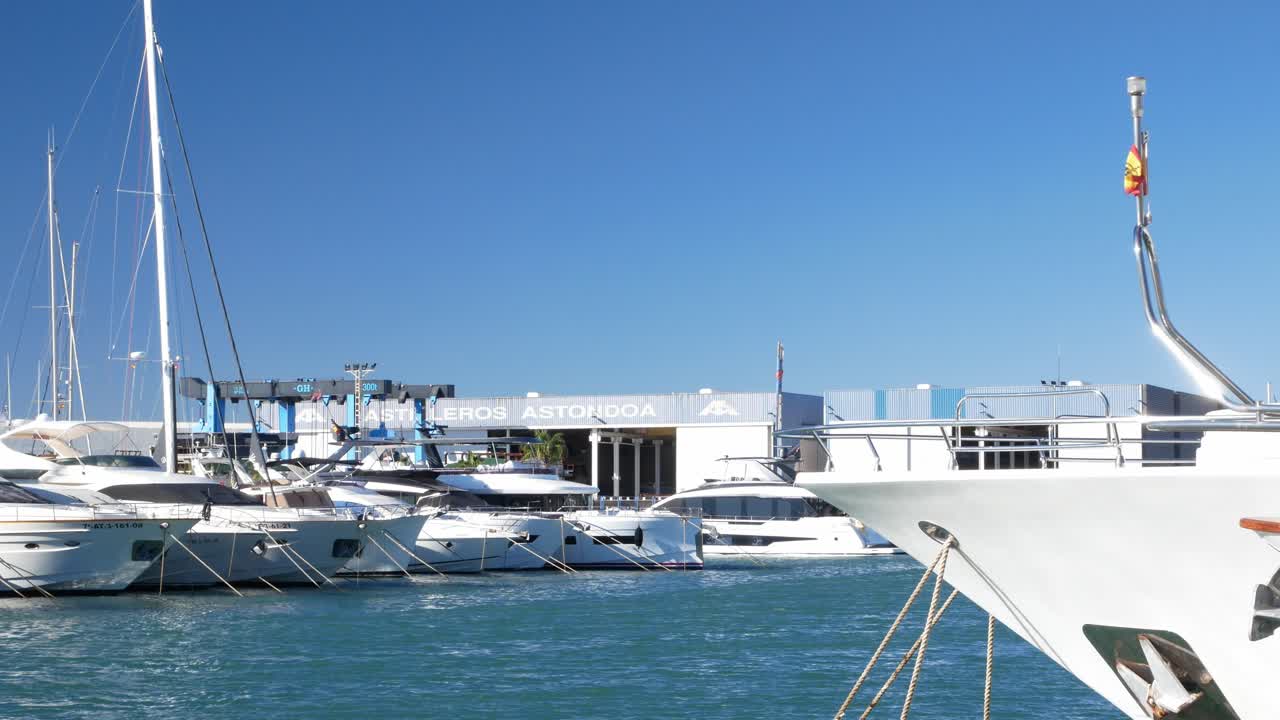 Line of yachts in front of the Astondoa Shipyards, Santa Pola, Spain