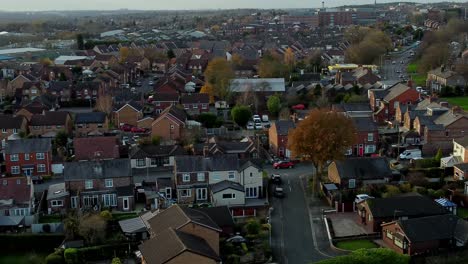 rainhill typical british suburban village in merseyside, england aerial view circling autumn residential council neighbourhood