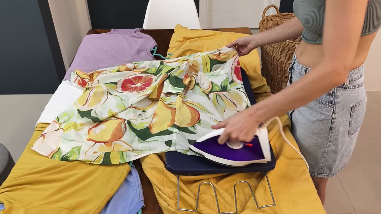 Woman ironing clothes