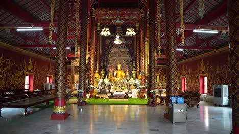 gold interior of wat chiang man temple in thailand