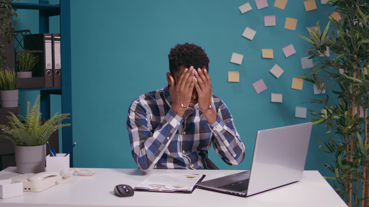 Frustrated worker feeling exhausted about office work
